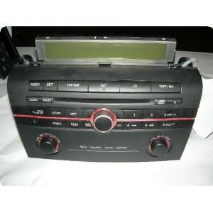 Radio  MAZDA 3 05 reciever/tuner, w/trim panel/display, AM FM CD, exc 