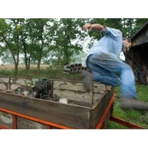  Man Jumps from a Trailer on a Farm in Nebraska Stretched 