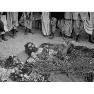Man Lying on Thorns at the Maha Yajna Prayer Festival to End World 