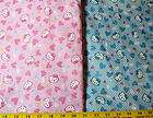 Hello Kitty fabric   Hearts   white Polka dots on blue   63 wide BTY 