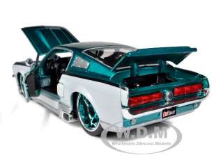   MUSTANG GT TEAL/WHITE CUSTOM 124 DIECAST MODEL CAR BY MAISTO 31094