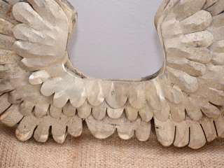   wings made of wood and metal these wings have a lovely pale gold
