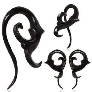  / Ear Stretcher with Sprouting Floral Shape. Floral design is carved 