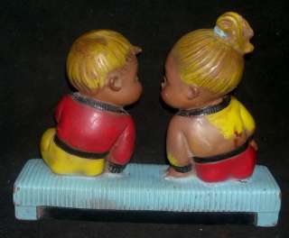 Vintage Rubber Toy Boy And Girl fighting.  