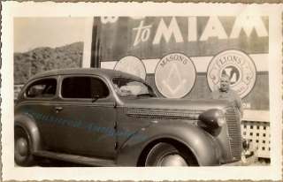 1937 Dodge Two Door Sedan Man at City Limits Welcome To Miami Sign 