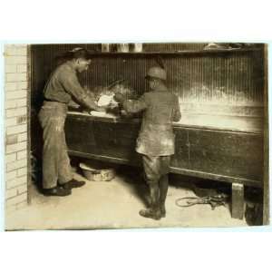   Angelo, 11 years old, baking bread for father, 174 Salem Street. Home