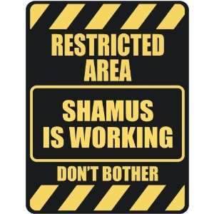   RESTRICTED AREA SHAMUS IS WORKING  PARKING SIGN