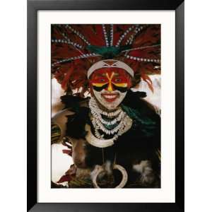  A Tribal Woman Decorated with Beads, Feathers, and Cowries 