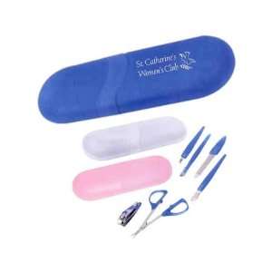   Manicure set with stainless steel implements.