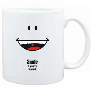    Mug White  Smile if youre lenient  Adjetives