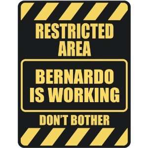   RESTRICTED AREA BERNARDO IS WORKING  PARKING SIGN