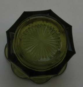 This is a very nice olive green candy dish, coin glass by Fostoria 