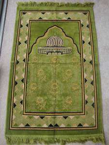 Prayer rug with Qibla compass  
