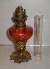   Red Glass Oil Lamp Chimney Gold Paint Overlay Design Cast Metal Base