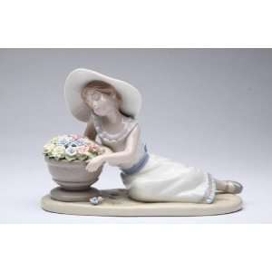  5.125 inch Ceramic Woman Figurine Smelling Flowers In 