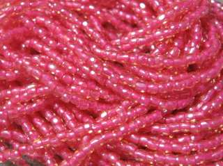 HANK 3 CUT PINK LINED TOPAZ SEED BEADS  