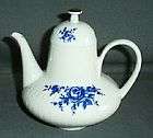 Edelstein, weiße Teekanne, blaue Blume, Relief, feuerfe