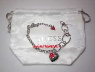New with tag and GUESS pouch
