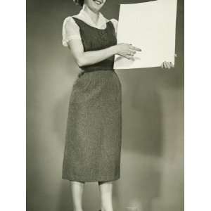Woman Holding Blank Sheet of Paper, Posing in Studio Photographic 
