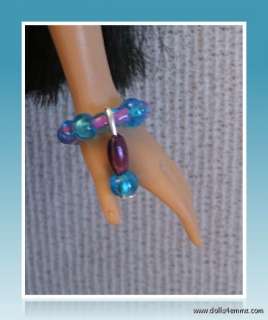 lined blue glass beads opalescent blue glass beads and purple oblong 