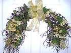 Large beautiful grapevine spray arch with gorgeous flowers for a wall 